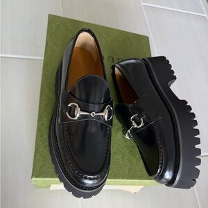 Gucci Glossy Black Loafers with Silver Detailing